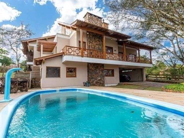 Casa com 5 dormitórios à venda, 460 m² por R$ 2.700.000,00 - Paragem dos Verdes