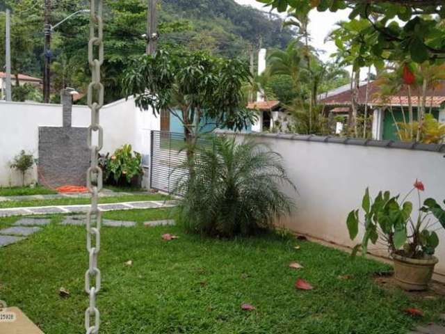 Casa com 4 quartos à venda no Massaguaçu, Caraguatatuba  por R$ 580.000