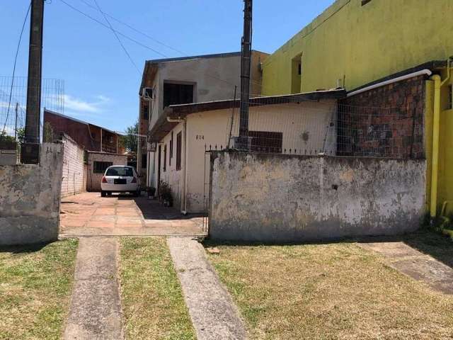 Terreno com casa bairro camboim