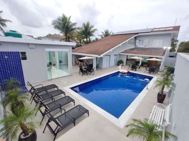 Casa com 5 dormitórios à venda, 525 m² por R$ 2.900.000,00 - Jardim Acapulco - Guarujá/SP