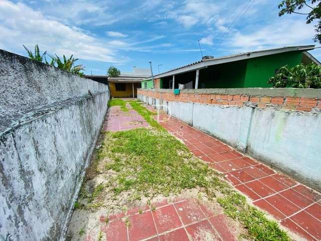 Terreno com construção em pontal