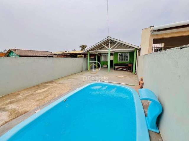 Casa com piscina a venda