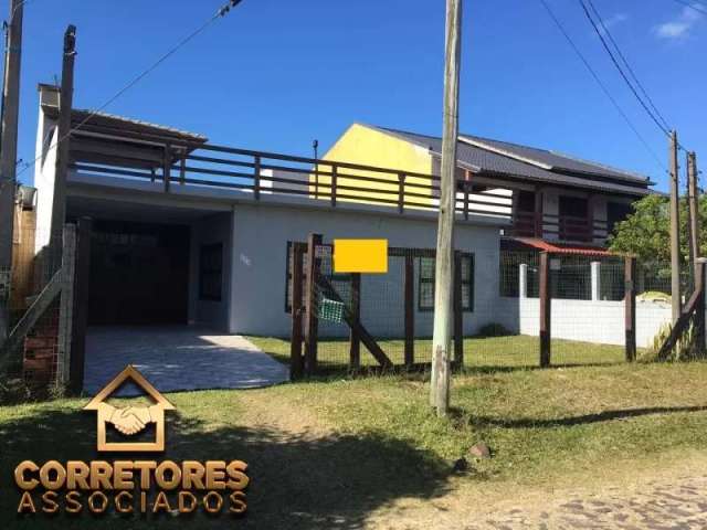 Casa com terraço e vista para o mar