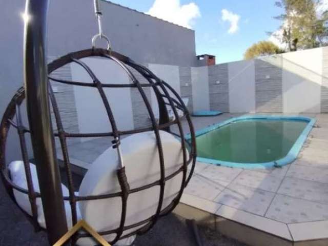 Casa aconchegante com piscina em nova tramandaí