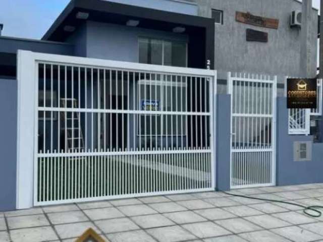 Casa com piscina em imbé