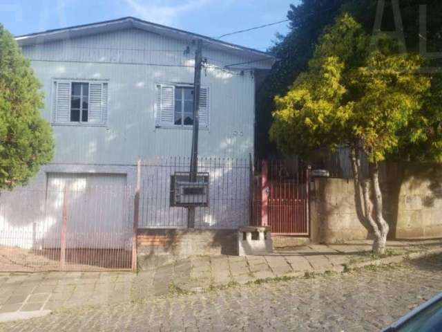 Casa com 3 quartos à venda na Rua Tiradentes, 1010, Sagrada Família, Caxias do Sul, 87 m2 por R$ 320.000