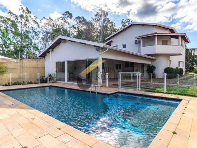 Casa em condomínio para aluguel em Sousas, com 6 suítes (2 térreas), espaço gourmet e garagem para 10 carros.