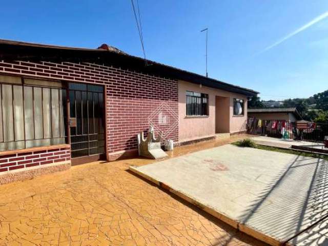 Casa com edícula na Palmeirinha