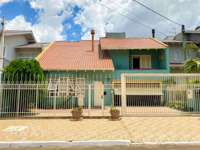 Casa com 4 quartos à venda na Rua Irmão Adão Rui, 398, Marechal Rondon, Canoas por R$ 1.950.000