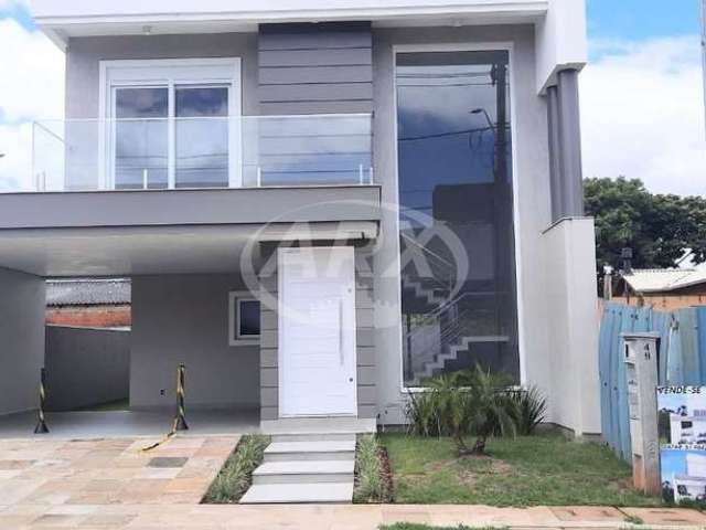 Casa em condomínio fechado com 3 quartos à venda na Rua dos Pinheiros, 49, Igara, Canoas por R$ 1.950.000