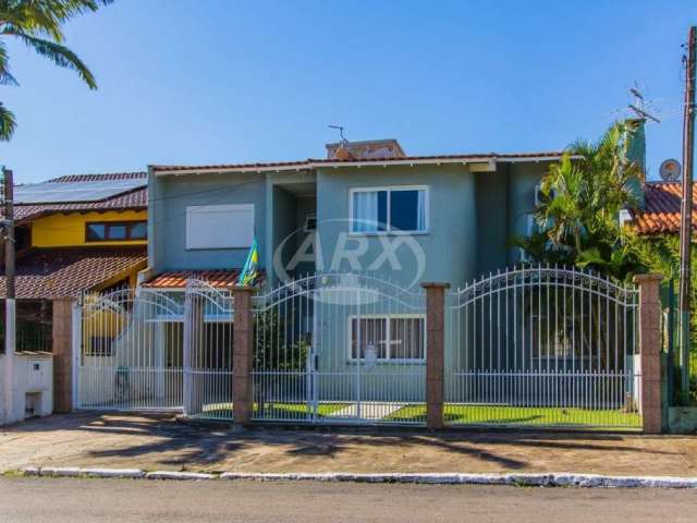 Casa com 4 quartos à venda na Rua das Camélias, 224, Igara, Canoas por R$ 744.000