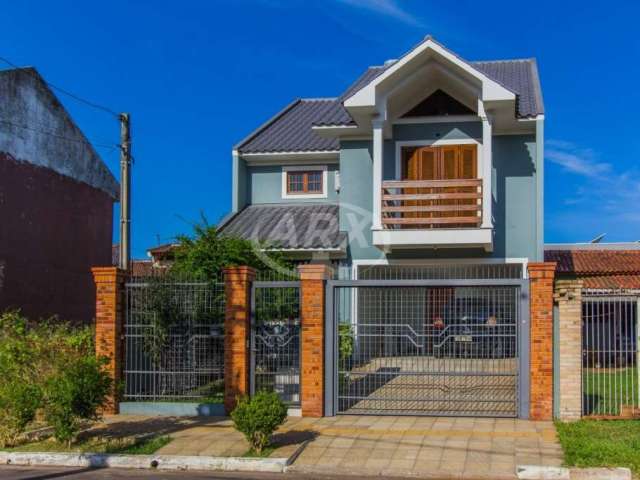 Casa com 3 quartos à venda na Rua Aluízio Palmeiro de Escobar, 75, São José, Canoas por R$ 692.000