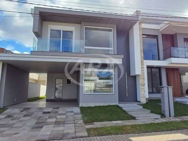 Casa em condomínio fechado com 3 quartos à venda na Rua dos Pinheiros, 3, Igara, Canoas por R$ 1.980.000