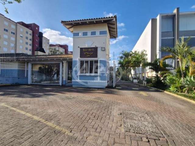 Casa em condomínio fechado com 3 quartos à venda na Avenida Santos Ferreira, 1180, Marechal Rondon, Canoas por R$ 400.000