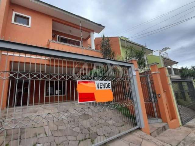 Casa com 3 quartos à venda na Rua Bélgica, 65, Marechal Rondon, Canoas por R$ 1.260.000