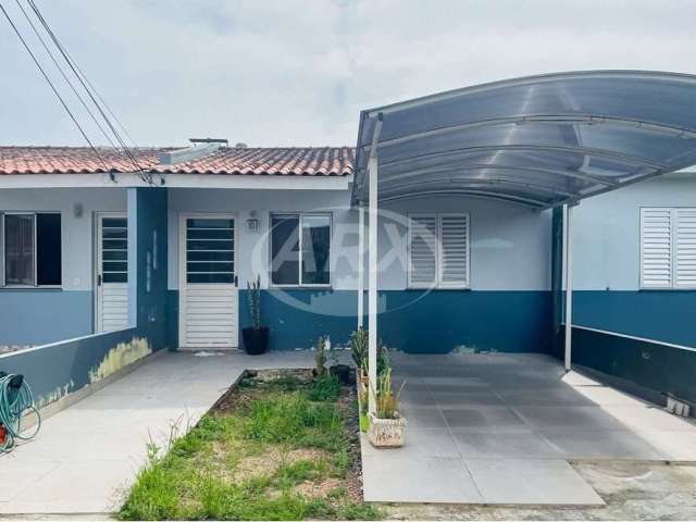 Casa em condomínio fechado com 2 quartos à venda na Rua Roberto Francisco Behrens, 200, Mato Grande, Canoas por R$ 259.900