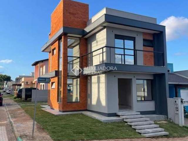 Casa com 3 quartos à venda na Rua Adams Filho, 4, Parque Ipiranga, Gravataí, 101 m2 por R$ 699.000