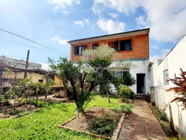 Casa com 3 quartos à venda na Rua Vinte e Cinco de Julho, 55, Santa Maria Goretti, Porto Alegre, 292 m2 por R$ 855.000