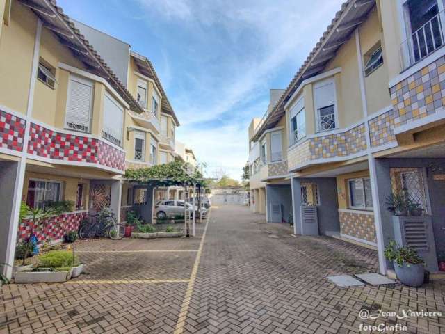 Casa em condomínio fechado com 2 quartos à venda na Rua Antônio Fonseca Barcelos, 200, Marechal Rondon, Canoas, 117 m2 por R$ 450.000