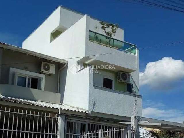 Casa em condomínio fechado com 3 quartos à venda na Rua Claudio da Silva Pinto, 692, Espírito Santo, Porto Alegre, 158 m2 por R$ 540.000