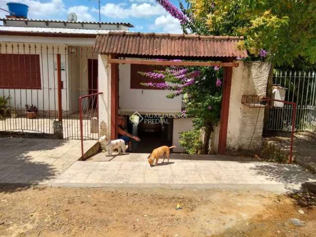 Casa com 3 quartos à venda na Rua Alberto Bins, 292, Aparecida, Alvorada, 185 m2 por R$ 290.000