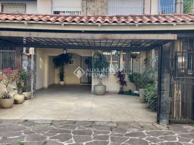 Casa com 3 quartos à venda na Rua Álvaro Domingues, 104, Parque Santa Fé, Porto Alegre, 91 m2 por R$ 450.000