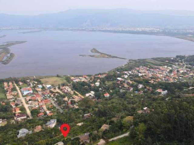 Terreno em condomínio fechado à venda na Geral Praia da Ferrugem, Capão, Garopaba por R$ 1.100.000