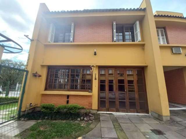 Casa em condomínio fechado com 4 quartos à venda na Rua General Gomes Carneiro, 80, Medianeira, Porto Alegre por R$ 477.000