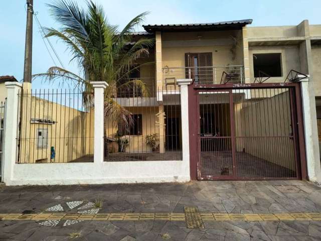 Casa com 4 quartos à venda na Ver. Adão da Silva Santos, 291, São José, Canoas por R$ 573.000