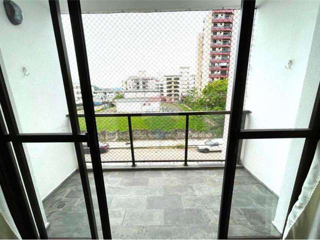 Apartamento 2 Dormitórios (1 suíte com armário embutido) Sala com sacada frente rua Cozinha Ampla Elevador Garagem Astúrias, Guarujá/SP.