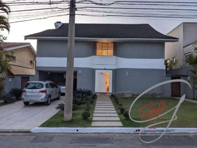 Casa de 900m² alto padrão no residencial 2 - alphaville - barueri-sp, c/5 suítes, escritório, garagem p/ 6 carros, piscina e área gourmet.