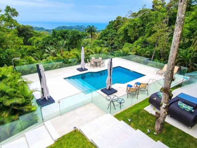 Casa À VENDA em São Pedro, condomínio na praia de Guarujá.