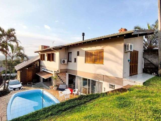 Casa com 4 dormitórios à venda, 248 m² por R$ 690.000,00 - Encosta do Sol - Estância Velha/RS