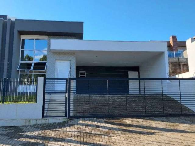 Casa com 3 dormitórios, 135 m² - venda por R$ 950.000,00 ou aluguel por R$ 6.163,00/mês - Solar do Campo - Campo Bom/RS