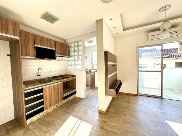 Apartamento com cozinha mobiliada no Iririú próximo da Igreja São Sebastião !