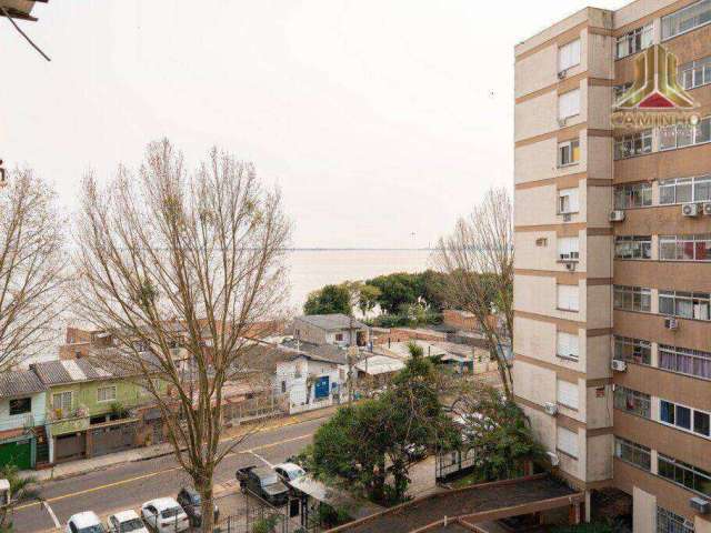 Vendo apartamento de dois dormitórios, com dependência e vista para o Guaíba em Porto Alegre