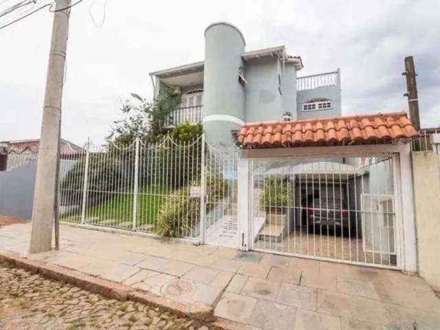 Casa com 4 quartos para alugar na Rua Graciano Azambuja, 341, Partenon, Porto Alegre por R$ 6.000