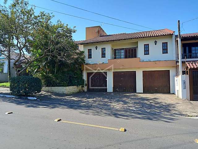 Casa com 5 quartos à venda na Rua Pompílio Gomes, 271, Dom Feliciano, Gravataí, 530 m2 por R$ 1.695.000