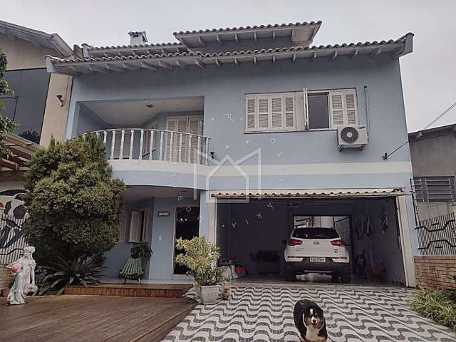 Casa com 5 quartos à venda na Rua Vinte de Setembro, Barnabé, Gravataí, 258 m2 por R$ 1.300.000