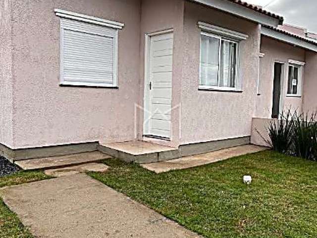 Casa em condomínio fechado com 2 quartos à venda na Rua Porto Alegre, Mato Alto, Gravataí, 44 m2 por R$ 188.500