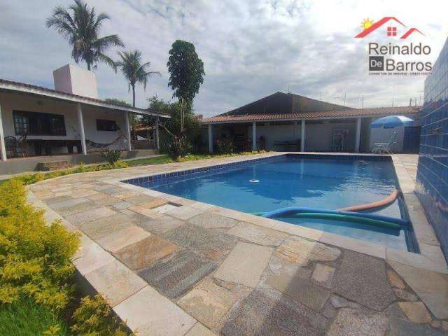 Casa térrea 4 suítes com piscina e churrasqueira a 400 mts da praia em Itanhaém .