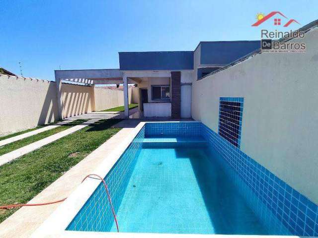 Casa com piscina lado praia em itanhaém