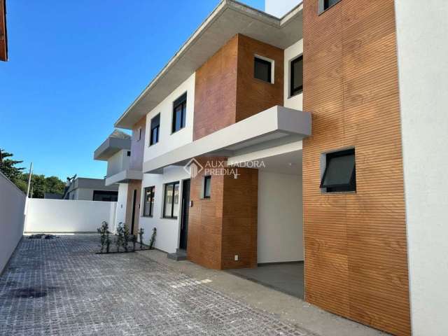 Casa com 3 quartos à venda na Avenida Cidade de Córdoba, 570, Barra da Lagoa, Florianópolis, 125 m2 por R$ 1.050.000