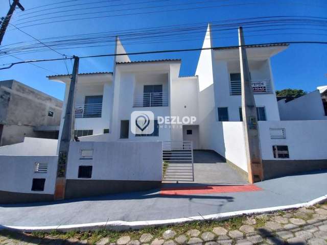 Geminado à venda em Potécas, São José - SC | Com Varanda