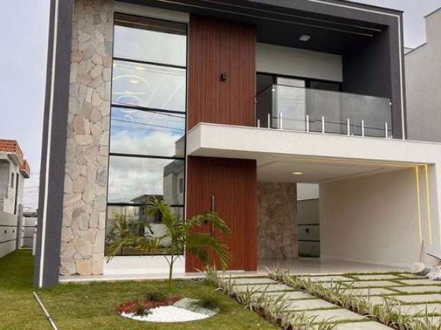 Casa com 4 dormitórios à venda, 220 m² por R$ 1.400.000 - Alphaville Camaçari - Camaçari/BA