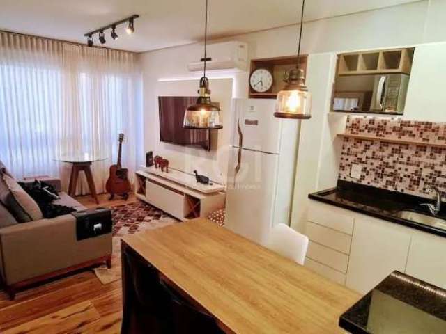 Ótimo apartamento estilo Estúdio, no Menino Deus, com conceito super moderno, integrando dormitório e living, decorado com muito bom gosto e todo mobiliado, com 36m² privativos. Ficam móveis sob medid