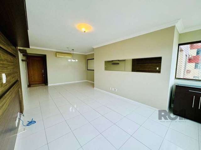 Apartamento com 95m² de  três dormitórios, uma suíte, living com dois ambientes,  churrasqueira, possibilidade de colocar lareira, cozinha, banheiro social, e um lavado, com duas vagas cobertas escrit