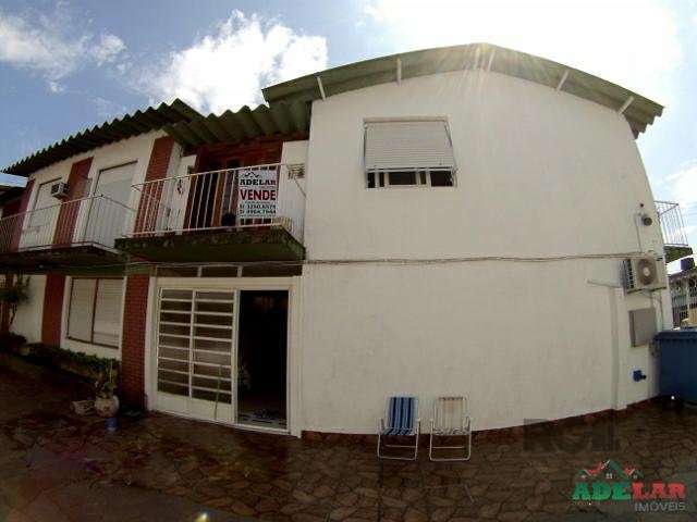 Casa / Sobrado no Cristal. Ótima Casa/Sobrado com 3 Dormitórios sendo 2 Dormitórios com Sacada, Ampla Sala de Estar, Cozinha, Lavabo, Escada para o Piso Superior Revestida em Madeira, Sala de Vídeo, S