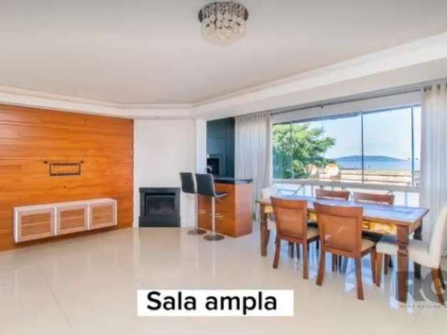 Linda casa com vista permanente para o Lago Guaíba, constituída de 4 dormitórios, sendo 1 suíte com hidromassagem e closet, banheiro da suíte com 2 cubas mais um mictório, 2 banheiro, cozinha moderna 