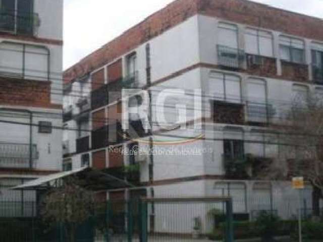 VENDE, apartamento térreo com 1 dormitório, living para 2 ambientes, cozinha, área de serviço fechada, banheiro social, piso frio. Gradeado. Prédio com segurança.